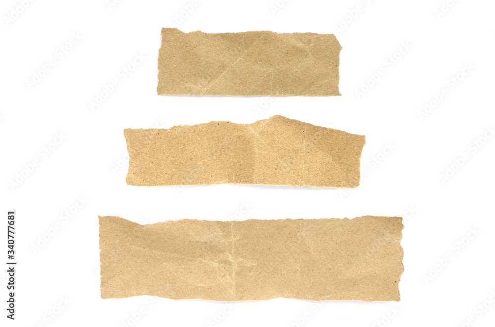 torn paper isolated on white background. Brown paper torn or ripped pieces of paper isolated on white background.