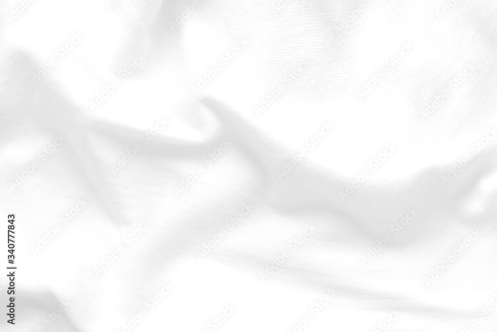 Obraz premium White cloth background abstract. Fabric is wrinkled and sofe wave. Material are used in textile assembly. detail texture of pattern design, elegance with free space copy for backdrop or wallpaper.