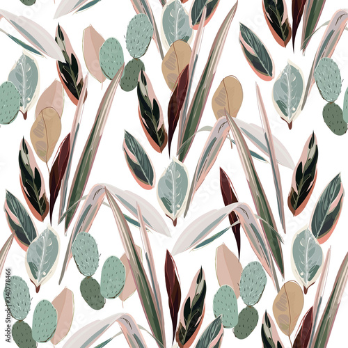 Pink and green leaves of palm trees and tropical grass on a white background....