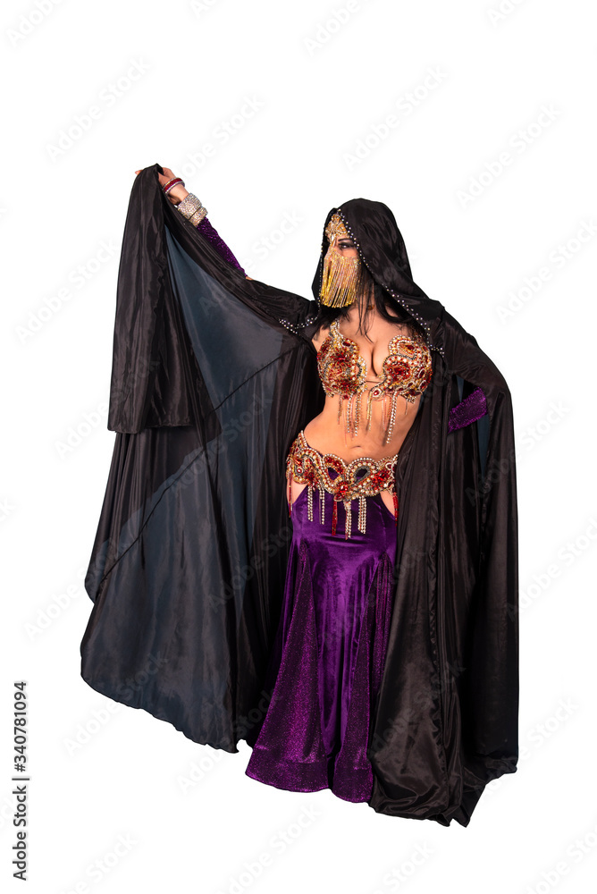 A dancer in a black cloak