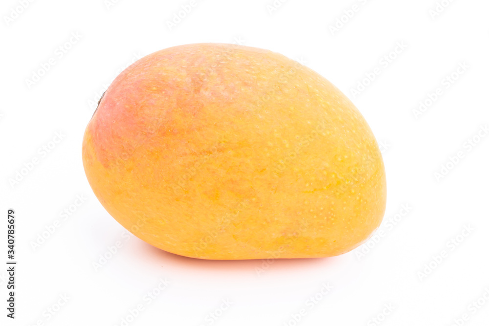 yellow mango on white background. The ripe mango is golden yellow in colour and it did look appealing yellow mango on white background. The ripe mango is golden yellow in colour and it did look appealing