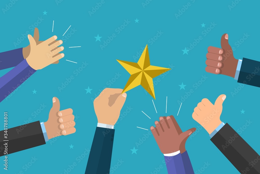 Businessman holding up a star, other hands clapping around. Businessman holding up a star, other hands clapping around.