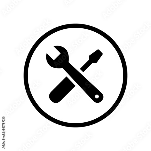 Black round screwdriver and wrench crossed tools icon, simple professional equipment flat design pictogram vector for app logo web banner button ui ux interface elements isolated on white background
