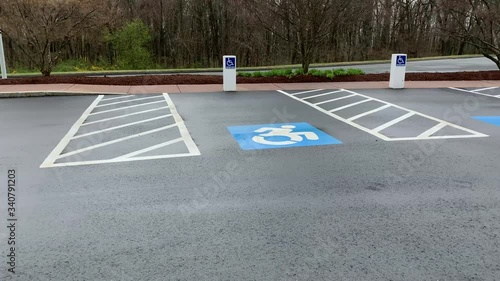 An empty parking lot showing handicap parking spaces