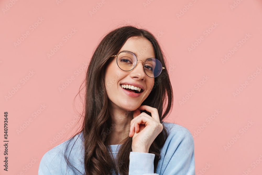Portrait of a cheerful girl with long curly brunette hair Portrait of a cheerful girl with long curly brunette hair