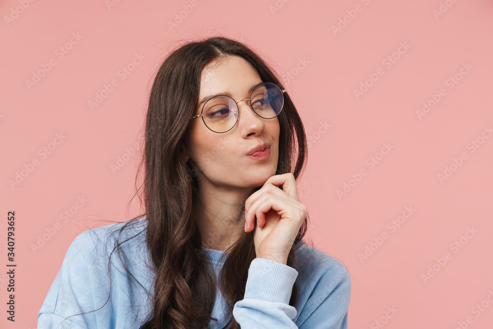 Portrait of a cheerful girl with long curly brunette hair Portrait of a cheerful girl with long curly brunette hair