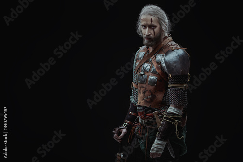 witcher with scars photo