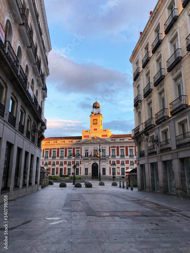 COVID-19 Spanish lockdown. Image of Empty street leading to the Royal Palace of Madrid city, Europe