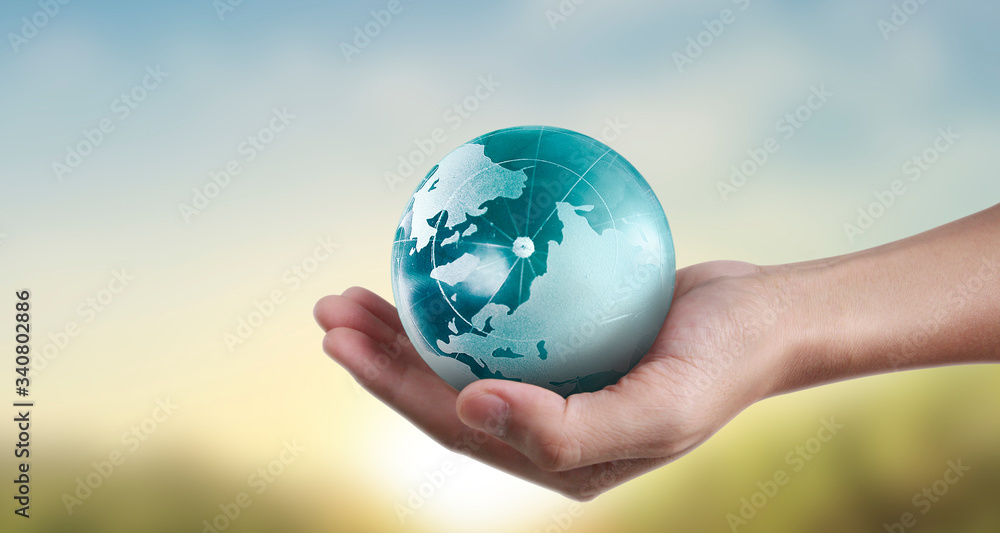 Globe ,earth in hand, holding our planet glowing. Earth image provided by Nasa Globe ,earth in hand, holding our planet glowing. Earth image provided by Nasa