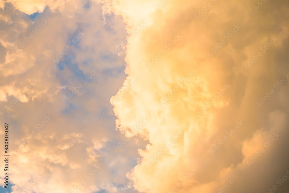 Beautiful gold color clouds on sky background
