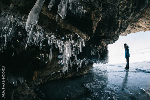 Man in an ice cave on Baikal
