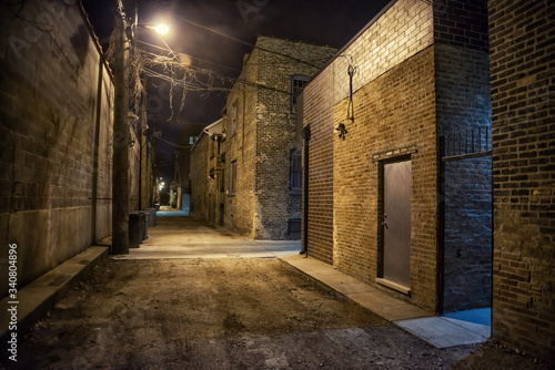 Dark and eerie urban city alley at night  © Bruno Passigatti