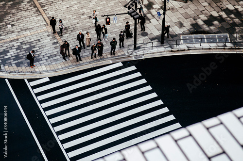 Modern city pedestrain crosswalk from aerial view. Street photo of Tokyo - Japan