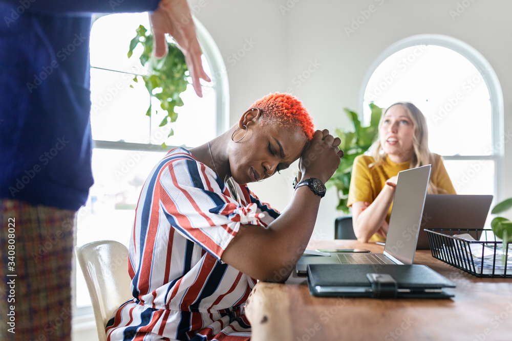 Fotografie Woman stressed out over work