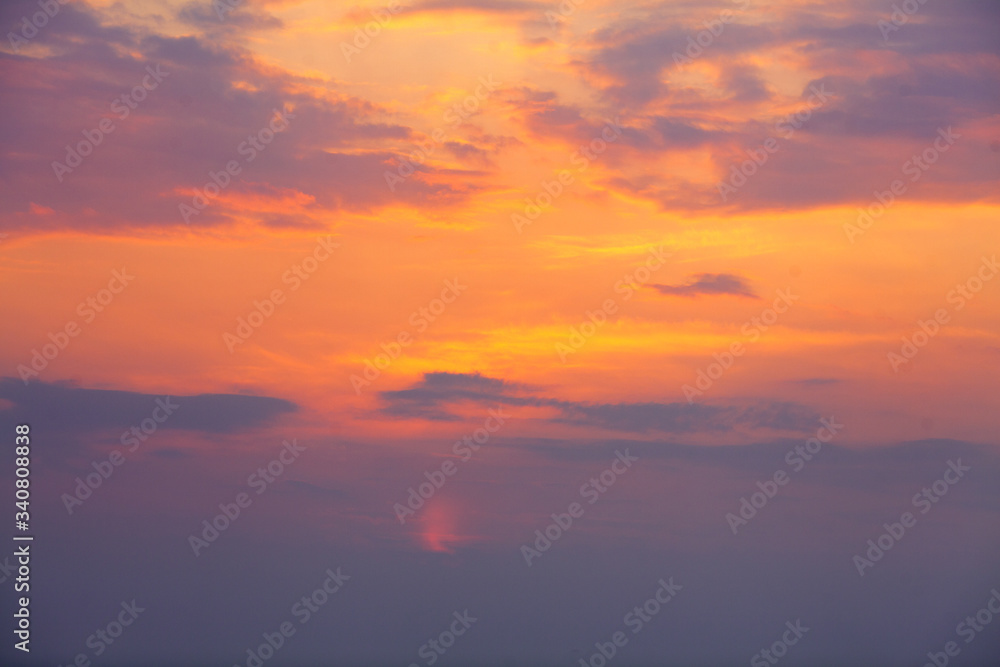 beautiful red-orange sunset on the sea, colorful sky and sea, magical landscape