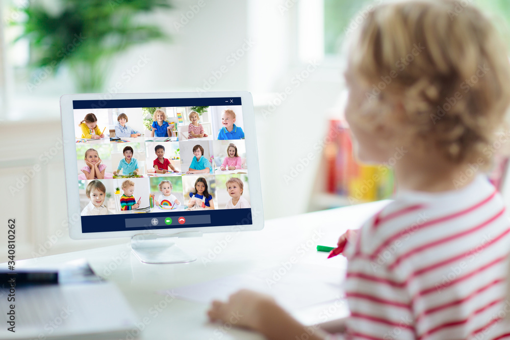 Online remote learning. School kids with computer. Online remote learning. School kids with computer.