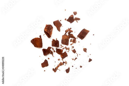 chocolate black pieces pile with almonds on white background
