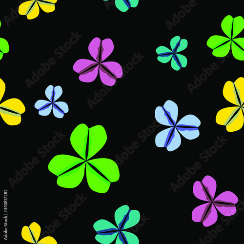 colorful shamrock leaves Seamless fabric pattern with black background © muhammad