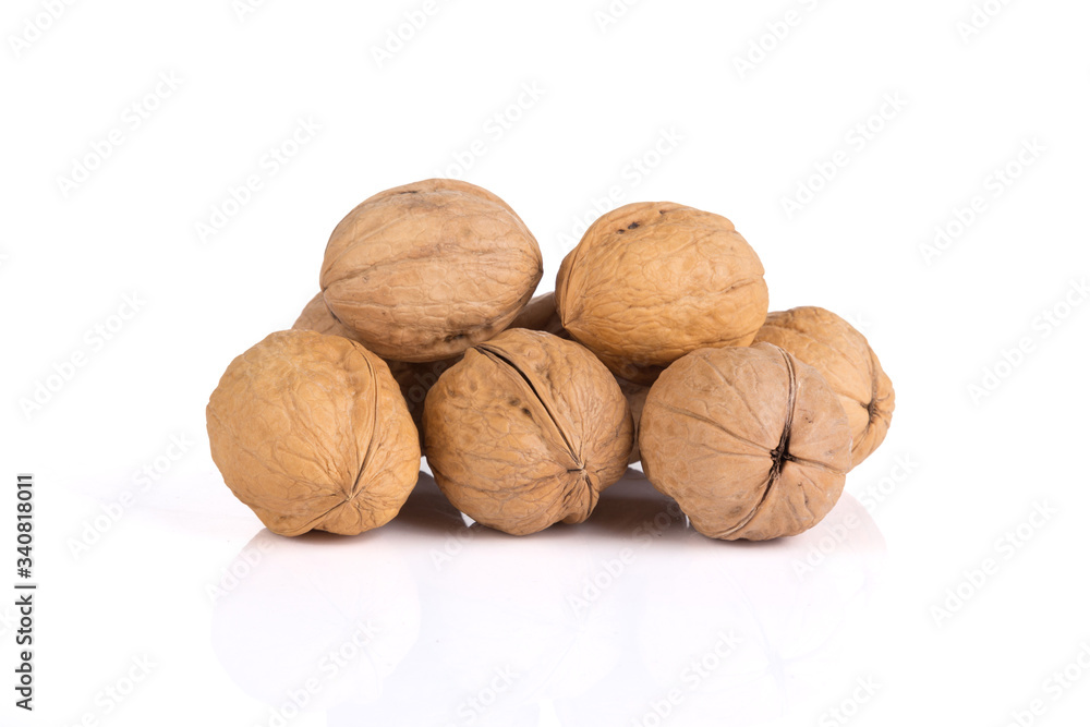 Walnuts on a white board Walnuts on a white board
