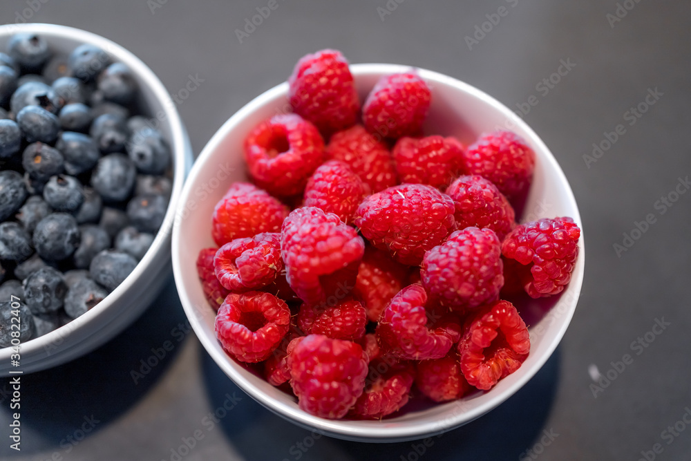 Fresh blueberries and raspberries in bowl Fresh blueberries and raspberries in bowl