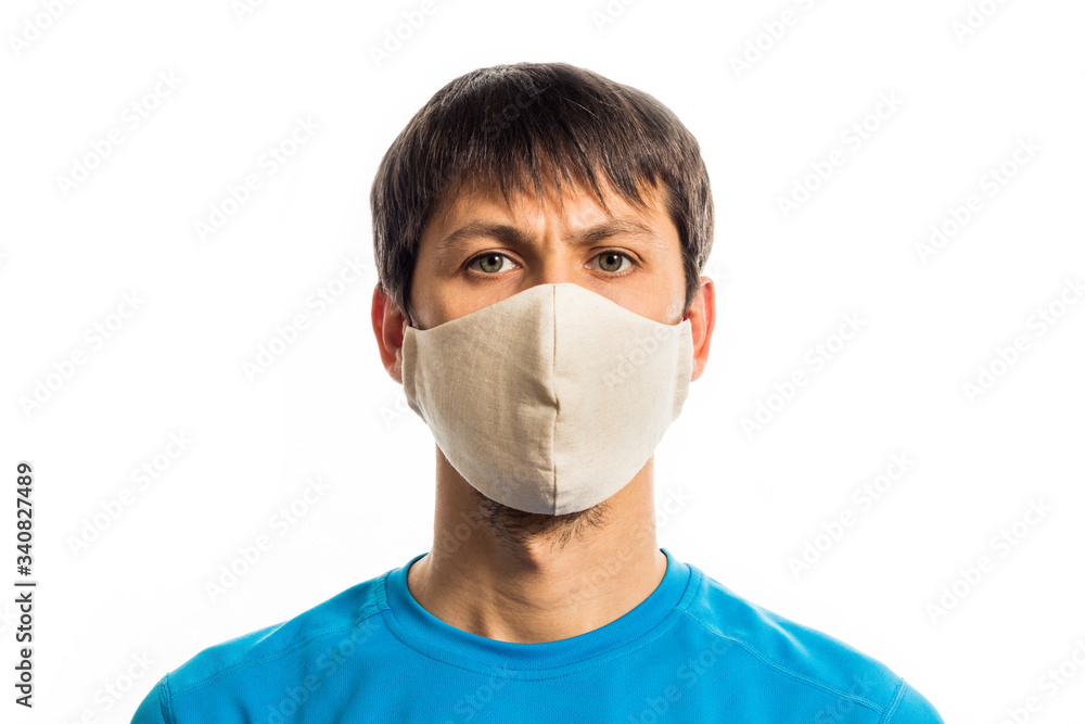 man wearing a protective mask for protection against firus coronavirus covid-19, isolated portrait on a white background