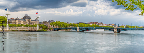 Quadro su tela Pont de l Universite bridge in Lyon, France over a panorama of the riverbank of