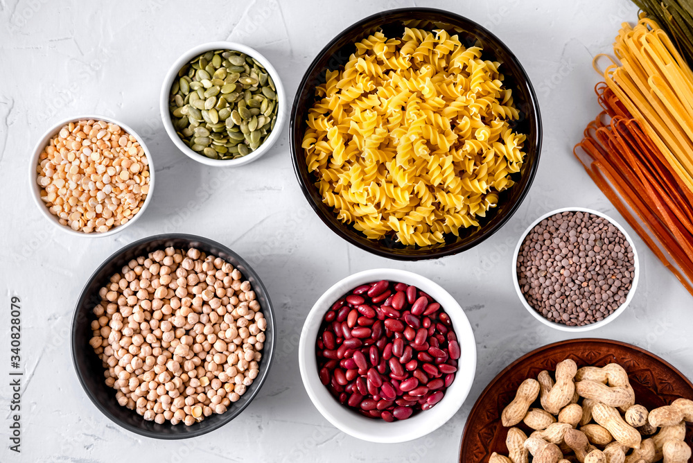 Pasta, lentils, Chickpeas And Beans In Bowls Top View. Pasta, lentils, Chickpeas And Beans In Bowls Top View.