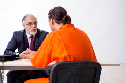 Young captive meeting with advocate in pre-trial detention