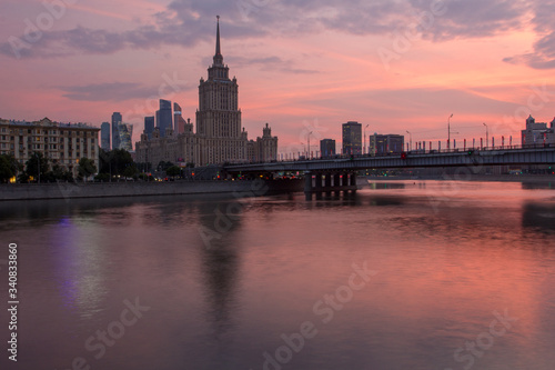 Sunset on the river. Moscow Stalin-era skyscraper at sunset.