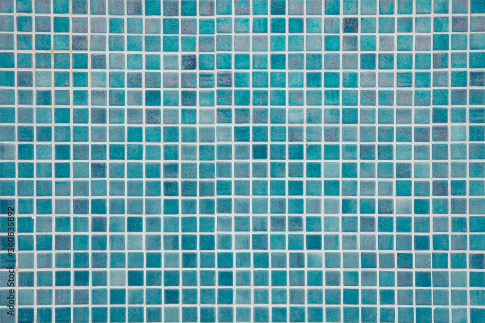 Aqua blue swimming pool mosaic tiles background, textured pool walls with copy space, a summer vacation inspiration, traveling to a tropical destination or relaxing holidays atmosphere concepts Aqua blue swimming pool mosaic tiles background, textured pool walls with copy space, a summer vacation inspiration, traveling to a tropical destination or relaxing holidays atmosphere concepts