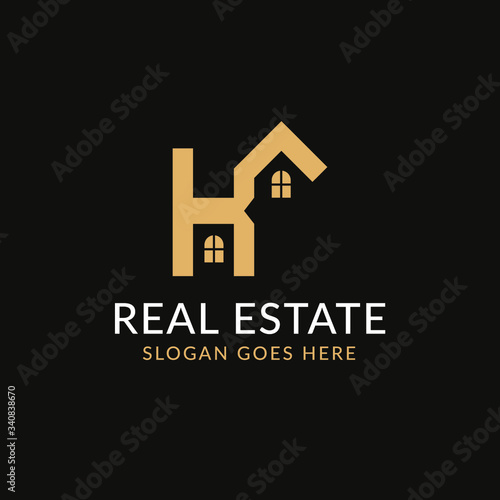 Creative real estate KA letter logo design. House, Property development, construction and building icon template. Isolated in dark background with gold color. Minimalist home vector in eps 10.