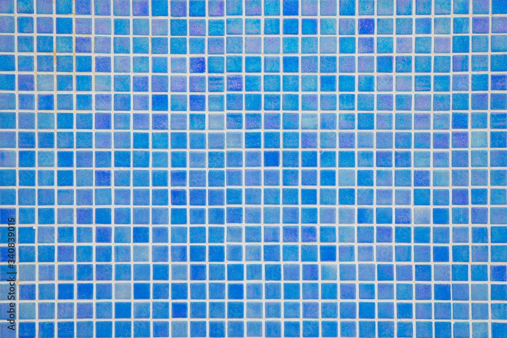 Ocean blue swimming pool mosaic tiles background, textured pool walls with copy space, a summer vacation inspiration, traveling to a tropical destination or relaxing holidays atmosphere concepts Ocean blue swimming pool mosaic tiles background, textured pool walls with copy space, a summer vacation inspiration, traveling to a tropical destination or relaxing holidays atmosphere concepts