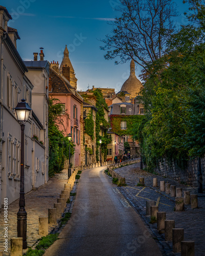 Photography View of old street in quarter Montmartre in Paris, France