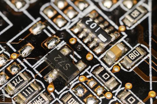 Miniature resistors on the computer motherboard.