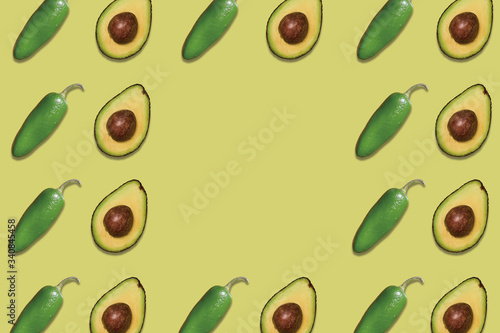 Wallpaper Mural patterns of delicious avocados and jalapeno peppers on green background Torontodigital.ca
