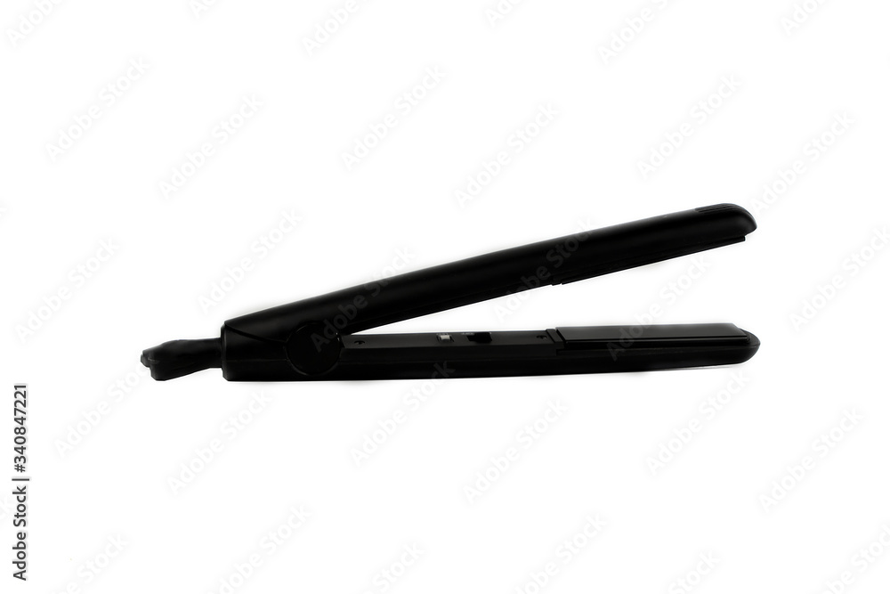 Hair straightener with ceramic plates isolated on white Hair straightener with ceramic plates isolated on white