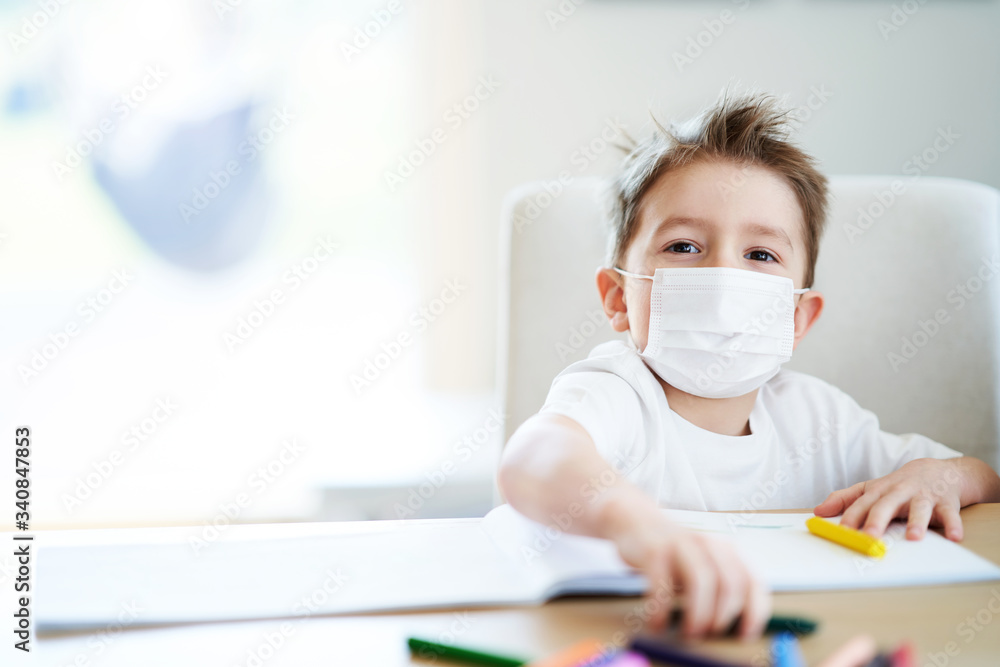 Little boy at home quarantine during coronavirus pandemic