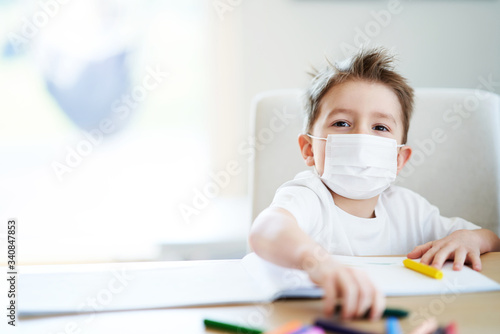 Little boy at home quarantine during coronavirus pandemic