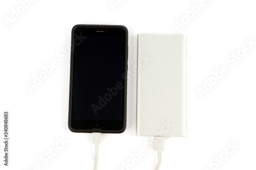 power bank and phone isolated on white background photo