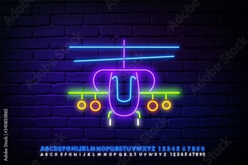 Icon neon lights of a military helicopter. Winter extreme sports, risky activities and adventures. Helicopter flight for war game. A glowing sign with the alphabet, numbers, and symbols.