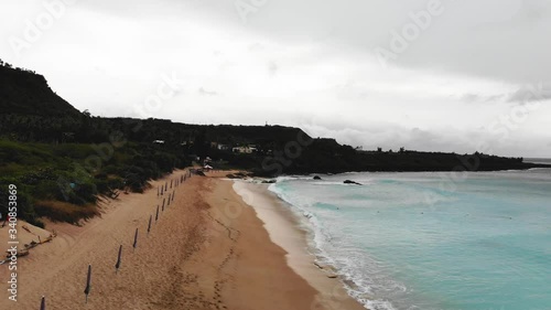 A high view of empty Kenting Baishawan beach with beautiful turquoise water, White Sand Bay, Hengchun Peninsula of Pingtung County, Taiwan. Drone 4k aerial shot. photo