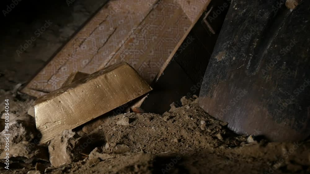 Treasure Chest Establishing Shot to Treasure Hunter's Gloved Hand Picking up Gold Brick In Slow Motion Treasure Chest Establishing Shot to Treasure Hunter's Gloved Hand Picking up Gold Brick In Slow Motion