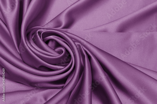 Smooth elegant silk or satin luxury cloth texture can use as abstract background.