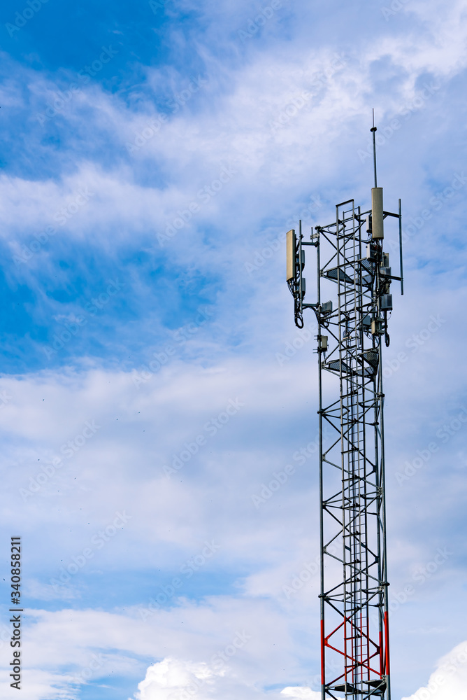 Telecommunication tower with clear blue sky background. Antenna on blue sky. Radio and satellite pole. Communication technology. Telecommunication industry. Mobile or telecom 4g network. Technology