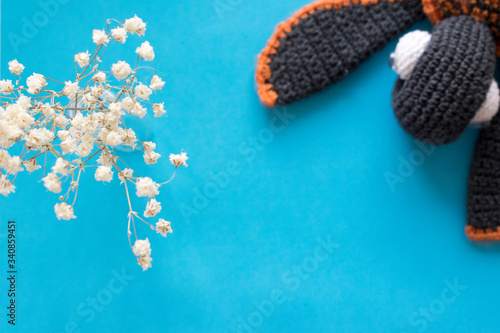 decorative flower and white flowers on a blue background
