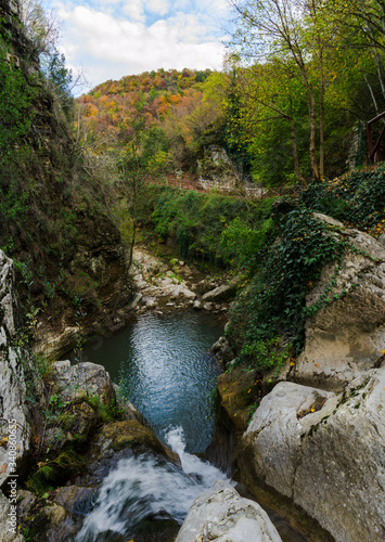 Panoramic view of San Fele waterfalls in a natural landscape  a popular hiking destination in Basilicata  Southern Italy