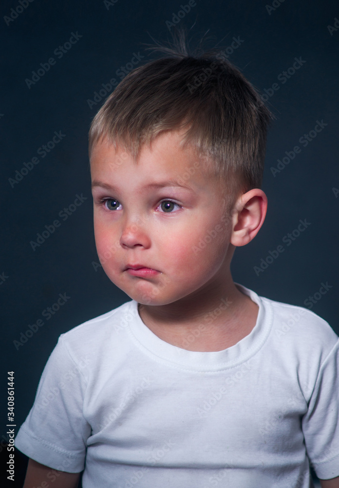 portrait of a boy with tears and resentment on his face portrait of a boy with tears and resentment on his face