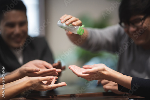 business people using alcoh...