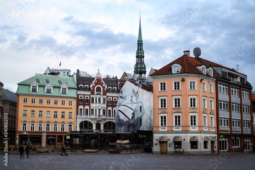 Beautiful Riga city architecture with old buildings and brick streets.