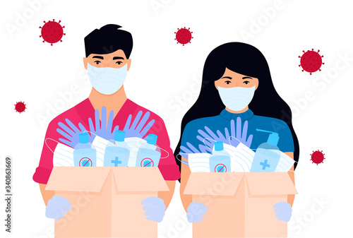 COVID-19. Humanitarian aid. Volunteers deliver medical protective masks, gloves and disinfectants. Coronavirus epidemic.